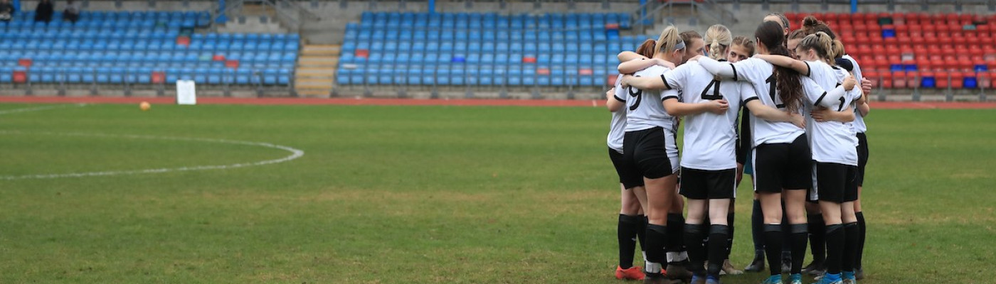 Team huddle from the BHASVIC Girls Football Team before their clash with Blenheim High School