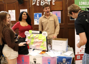 BHASVIC students explore the debate society stand at the Freshers Fair