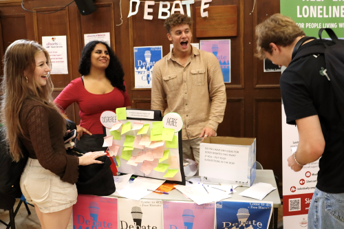 BHASVIC students explore the debate society stand at the Freshers Fair