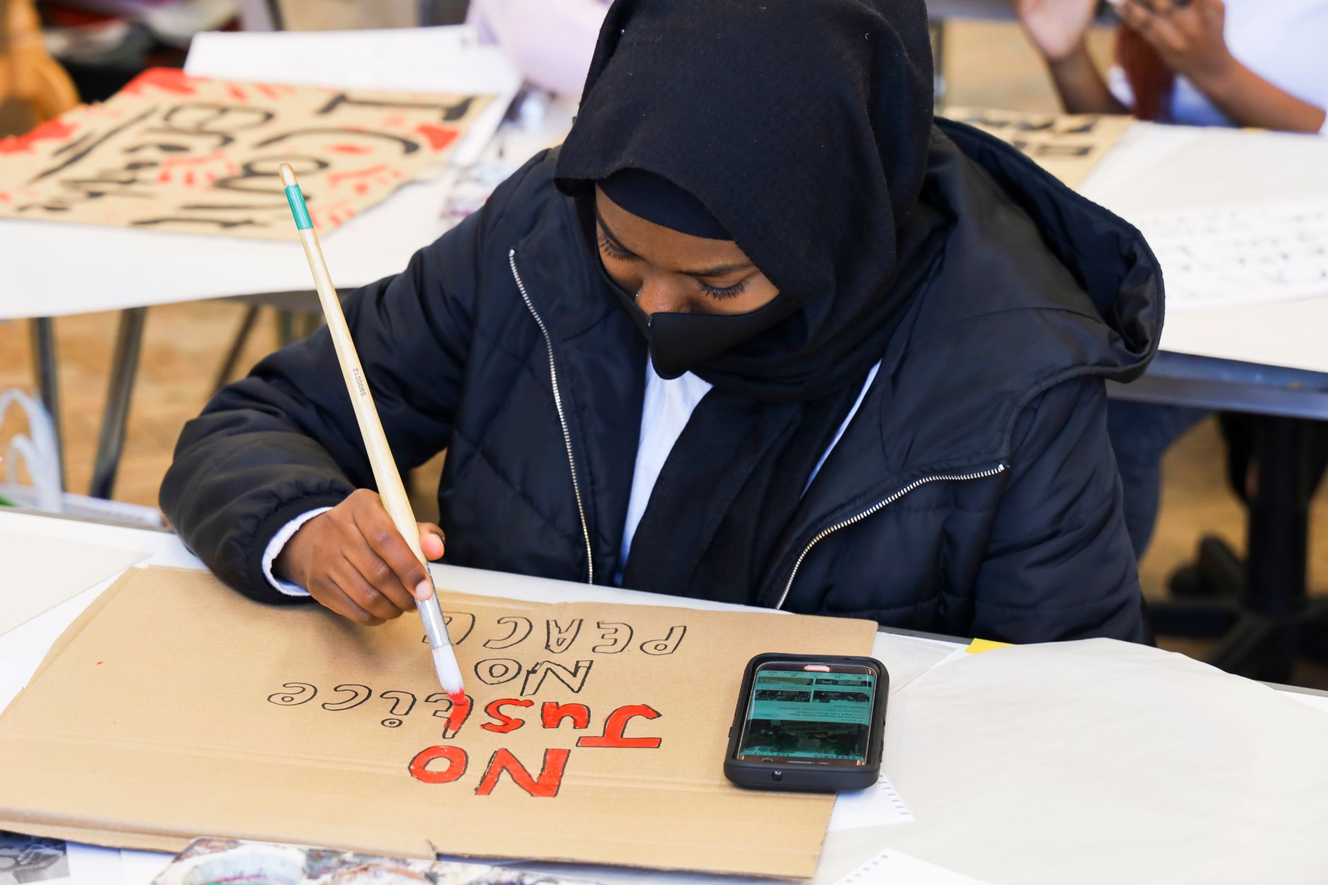 The student-led African Caribbean Society took part in a placard making workshop
