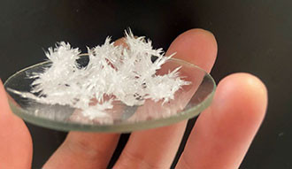 The needle shaped crystals are the shape adopted by pure solid aspirin