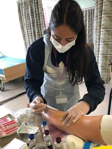 Mallika Livgren-Arjun at work tending to a patient