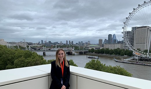 Asta Trower at work with view of London in the background