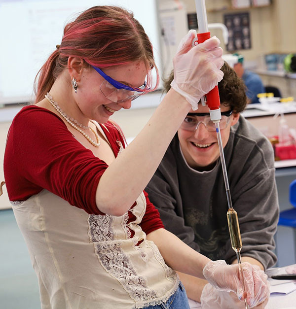 “All the good ones Argon!” Gina multitasks by extending Raf’s chemistry joke repertoire whilst filling her pipette