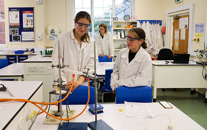 Olivia and Summer wait for their final product (below) to start collecting in the measuring cylinder during distillation.