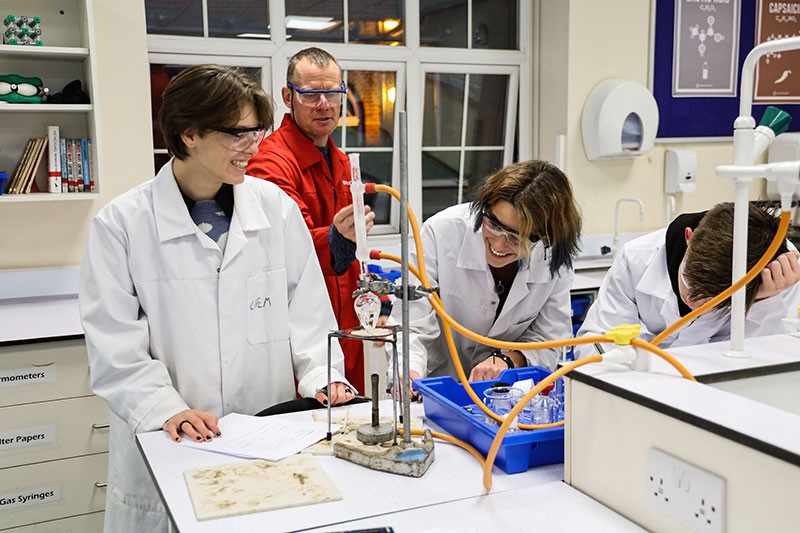 Sofia and Zeynep check the angle of their condenser before heating! 