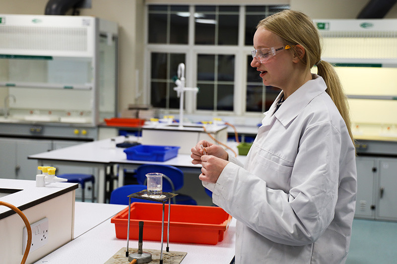 Lucy gets ready to set her reagents up (inside her shortened pipette) in a water bath at 70-80oC