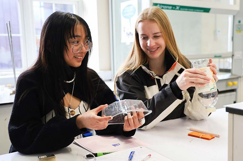 Once the plastic item has been selected, it’s down to work! Val and Eva look for the recycling stamp that will identify the particular polymer their item is made of.