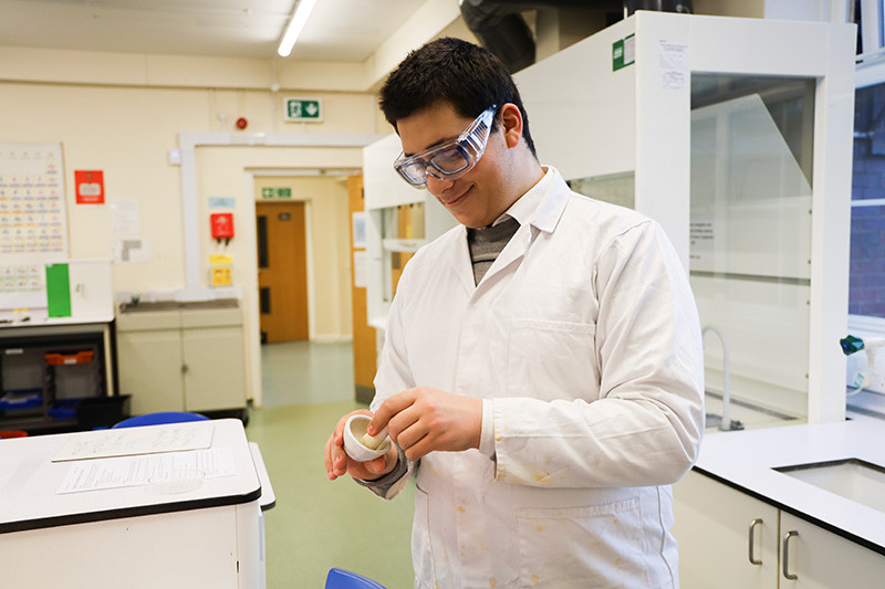 George grinds the ash from the burnt match – which hopefully now contains some iron formed from the reduction of the iron (III) oxide!