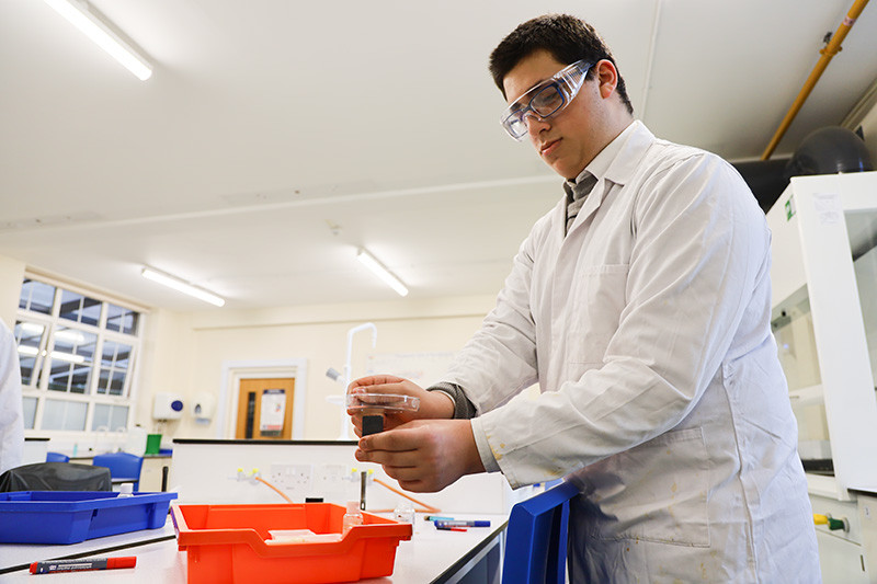 George tests out his ground up ash using a magnet – the iron (III) oxide is not magnetic so anything moving around over the magnet must be pure iron