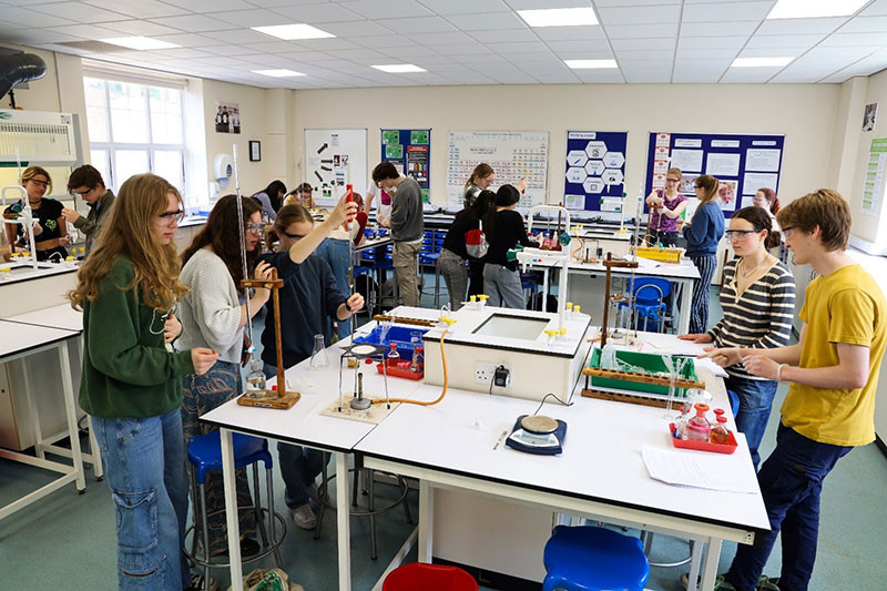 Eve, Flo and Harriet (left) carry out their titrations whilst Lola and Jack (right) set up for gravimetric analysis